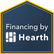 A blue and yellow house with the words financing by hearth