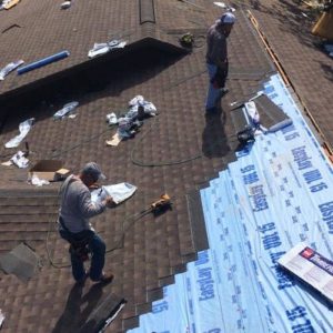 Roofers Replacing Shingles
